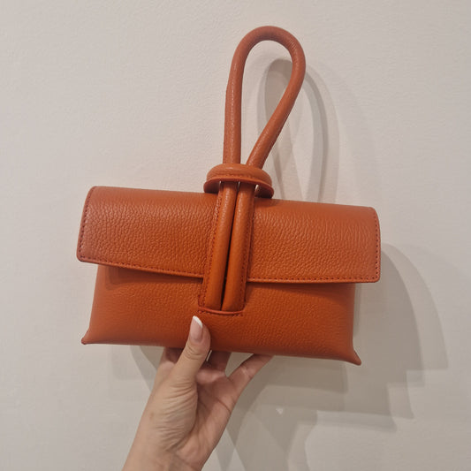 Loop handle leather bag.