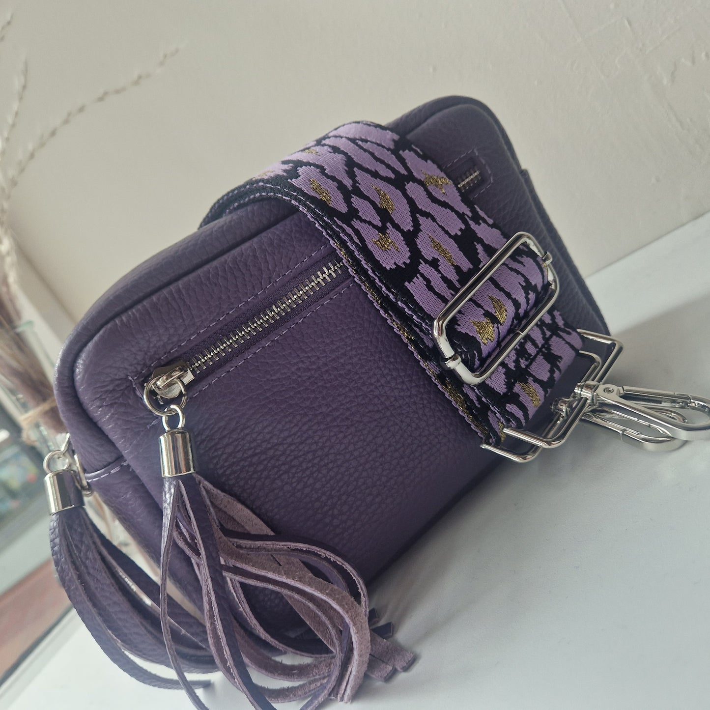 Purple/gold bag strap